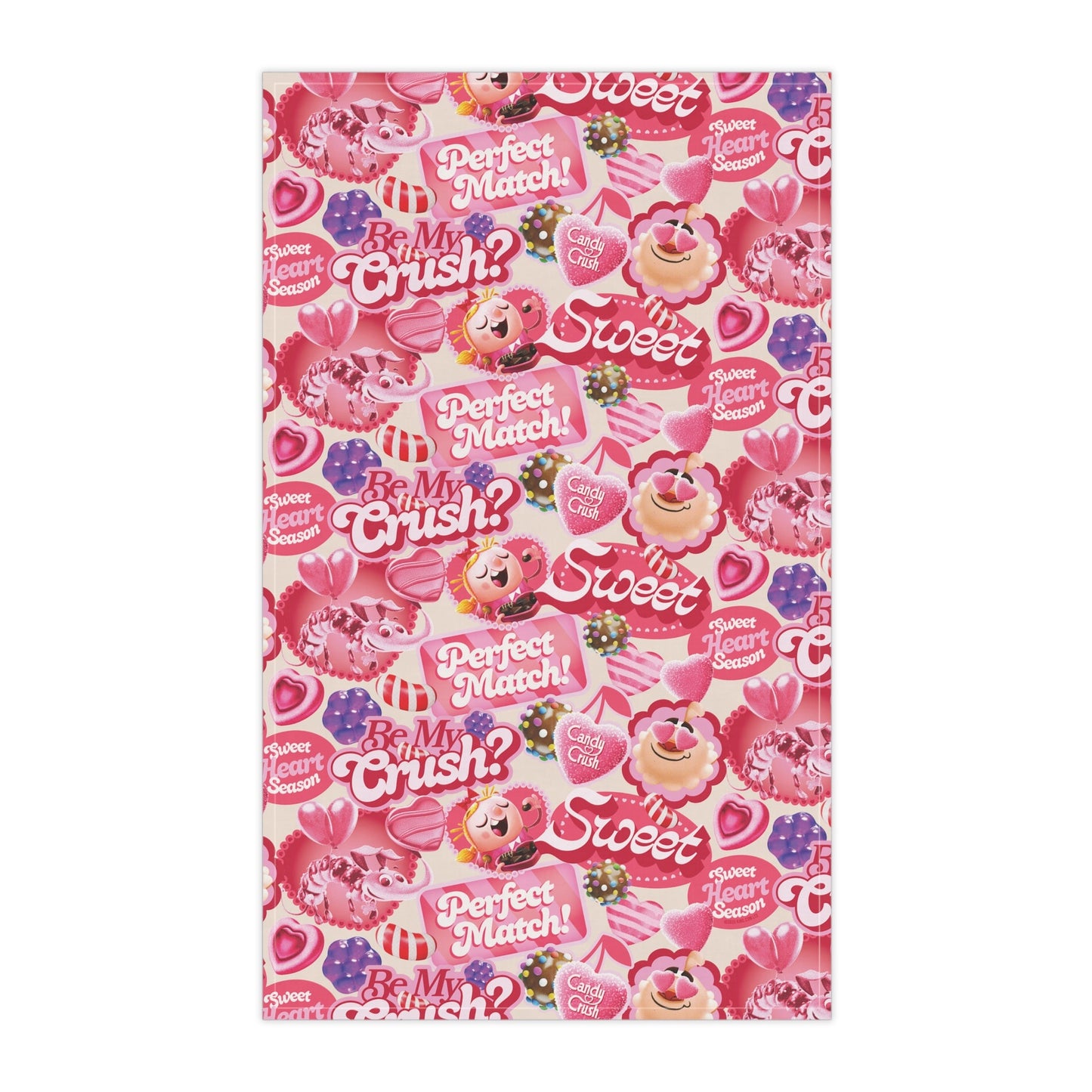 Lifestyle view of the Candy Crush towel hanging in a brightly lit kitchen setting