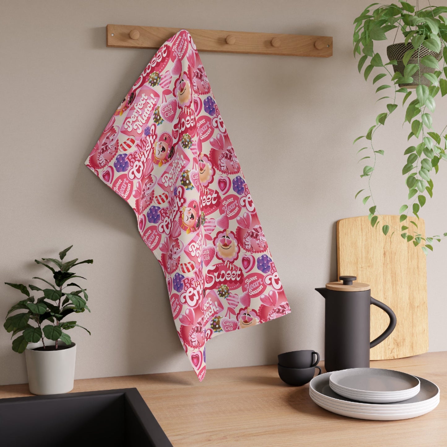 Close up of the Be My Crush text on the vibrant Candy Crush kitchen towel