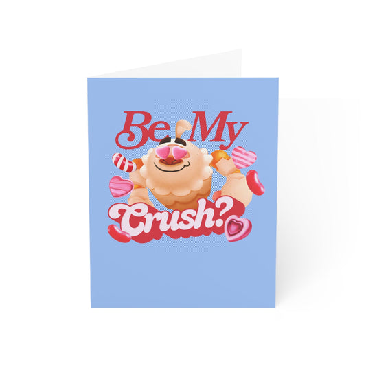 Front of the Candy Crush Be My Crush? Valentine's Day Greeting Card showing pink and red candy designs.