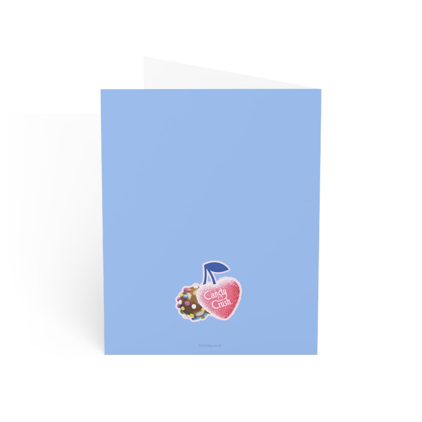 The Candy Crush greeting card displayed next to its included white envelope.