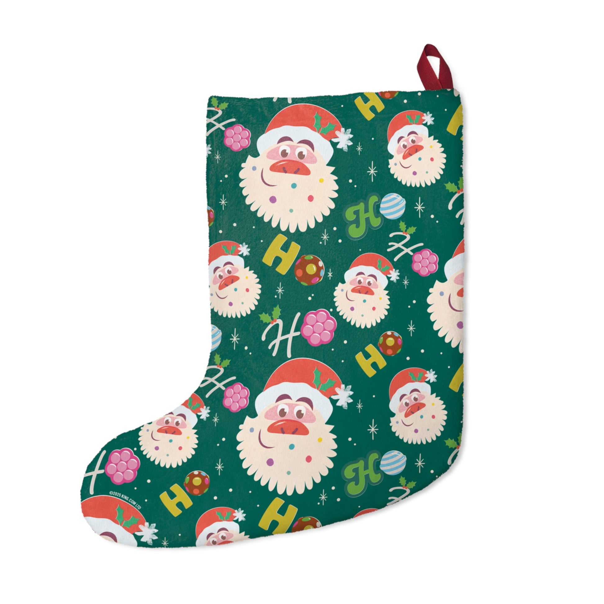 Close-up of the plush polyester fabric and festive candy print on the Candy Crush Holiday Stocking.