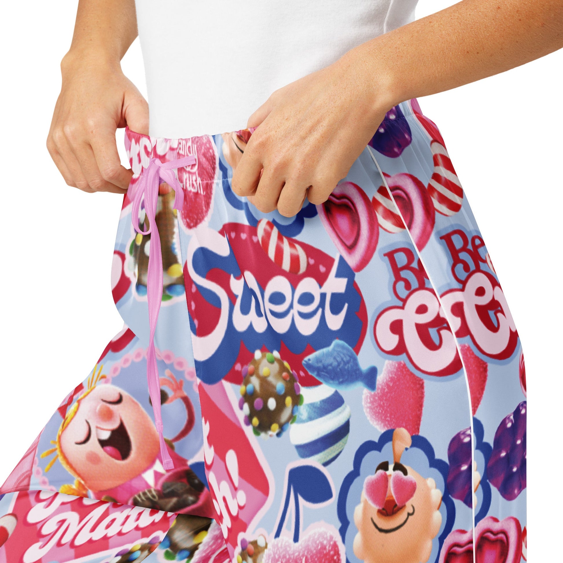 Side view of Candy Crush lounge pants showing the elastic waistband and pocket detail