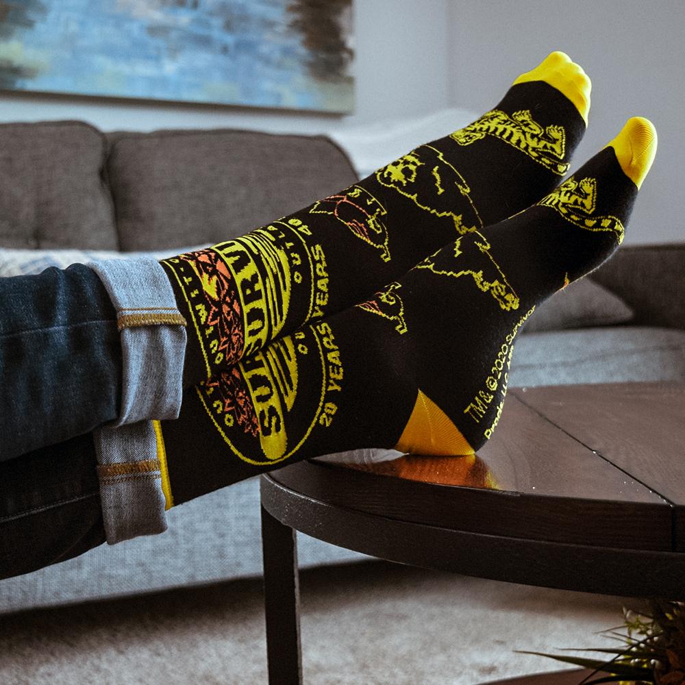 Survivor 20 Years 40 Seasons All Over Black and Yellow Tribal Pattern Socks | Official CBS Entertainment Store