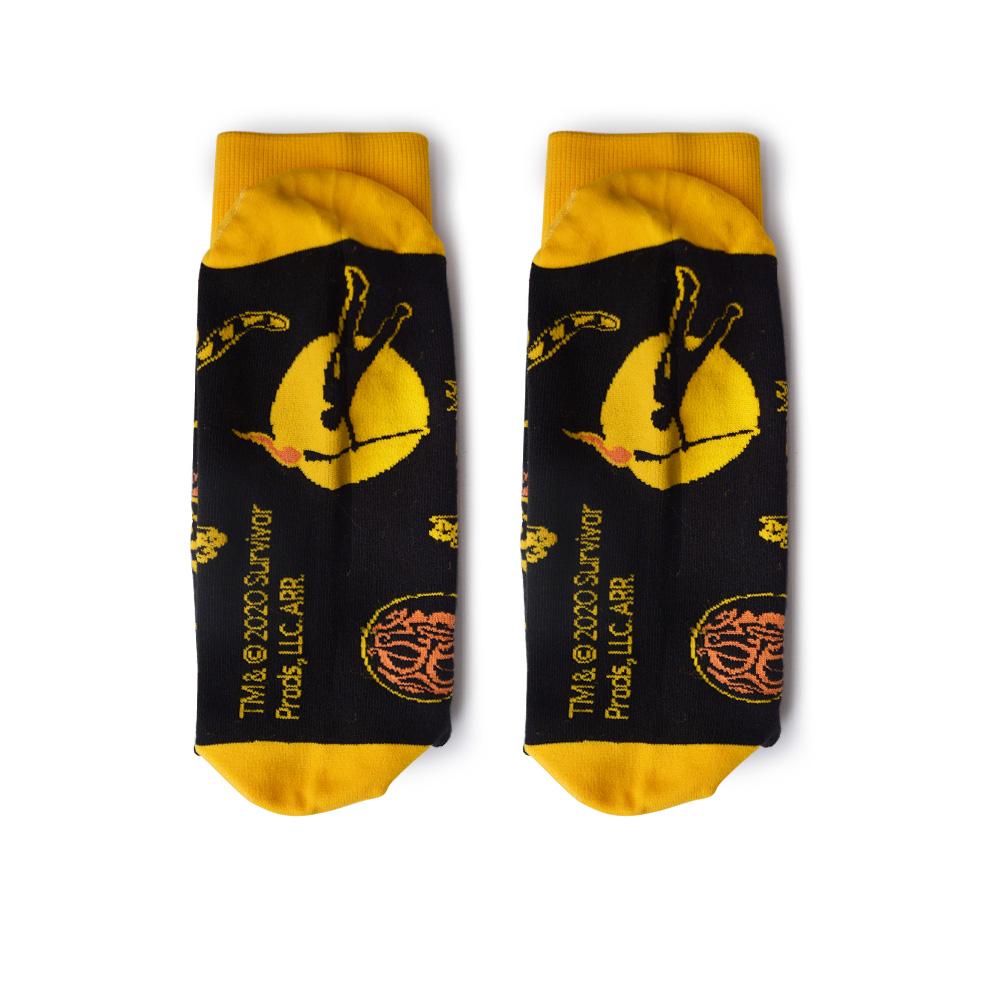 Survivor 20 Years 40 Seasons All Over Black and Yellow Tribal Pattern Socks | Official CBS Entertainment Store